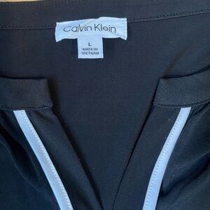 Calvin Klein Black Garment with White Accents